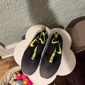 Nike Black and Neon Green Slip-On Sneakers